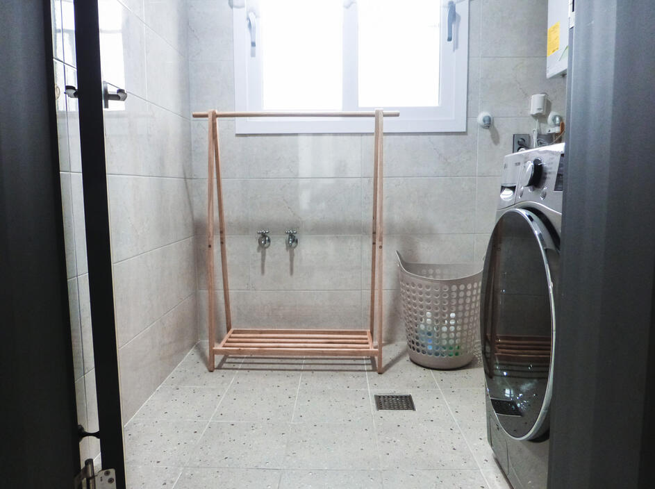 Finally, the laundry room with a drying rack and windows for a breeze Finally, the laundry room with a drying rack and windows for a breeze
